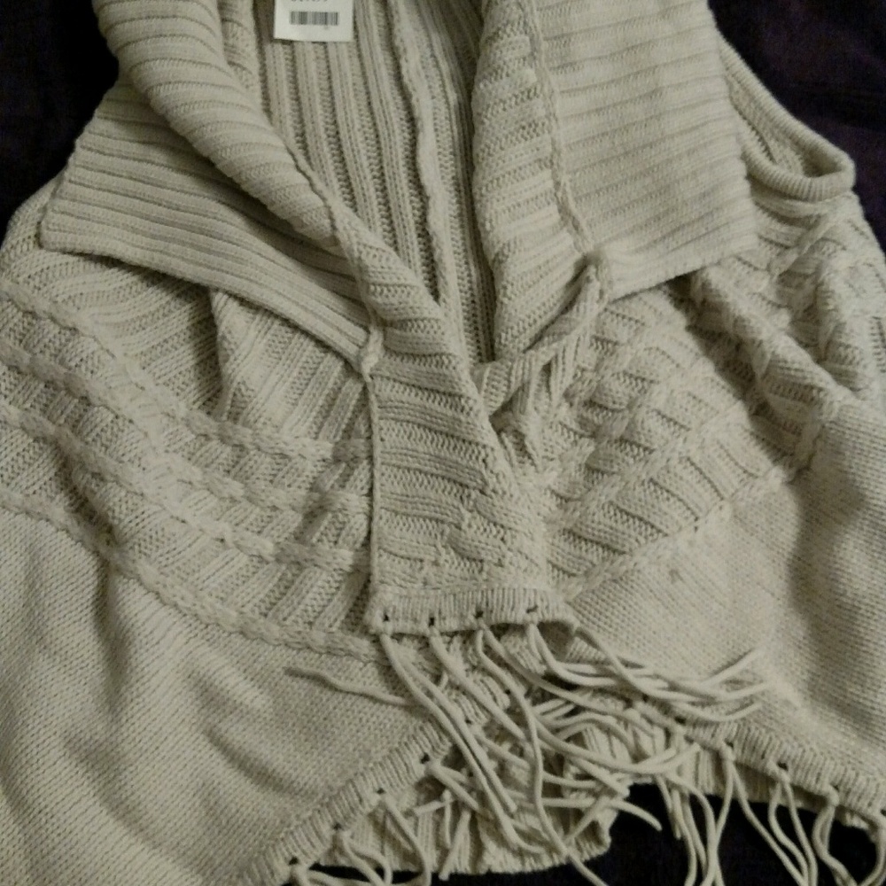 Creme colored vest